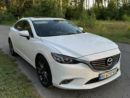 Белый Мазда 6, объемом двигателя 2.49 л и пробегом 137 тыс. км за 15900 $, фото 1 на Automoto.ua