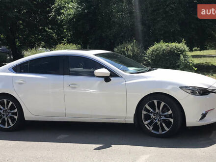 Белый Мазда 6, объемом двигателя 2.5 л и пробегом 76 тыс. км за 20000 $, фото 1 на Automoto.ua