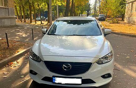 Білий Мазда 6, об'ємом двигуна 1.6 л та пробігом 144 тис. км за 16500 $, фото 1 на Automoto.ua