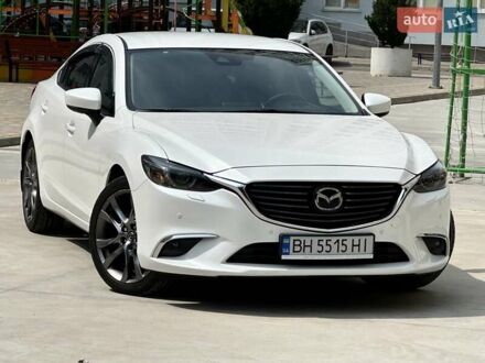 Білий Мазда 6, об'ємом двигуна 2.19 л та пробігом 75 тис. км за 18300 $, фото 1 на Automoto.ua