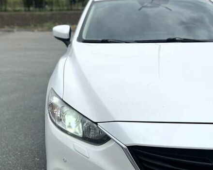 Белый Мазда 6, объемом двигателя 2 л и пробегом 154 тыс. км за 15999 $, фото 1 на Automoto.ua