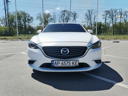Белый Мазда 6, объемом двигателя 2.5 л и пробегом 142 тыс. км за 13700 $, фото 1 на Automoto.ua