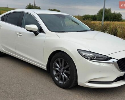 Белый Мазда 6, объемом двигателя 2 л и пробегом 143 тыс. км за 19750 $, фото 1 на Automoto.ua