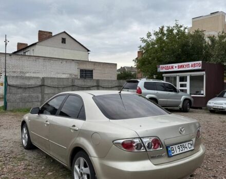 Бежевий Мазда 6, об'ємом двигуна 2 л та пробігом 256 тис. км за 3750 $, фото 5 на Automoto.ua