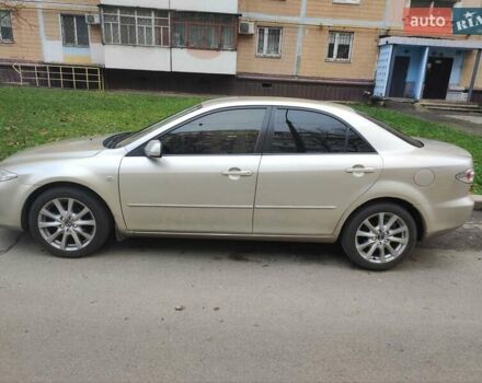 Бежевый Мазда 6, объемом двигателя 2 л и пробегом 244 тыс. км за 4500 $, фото 2 на Automoto.ua