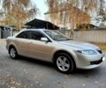 Бежевый Мазда 6, объемом двигателя 2 л и пробегом 350 тыс. км за 5800 $, фото 1 на Automoto.ua