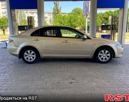 Бежевий Мазда 6, об'ємом двигуна 2 л та пробігом 189 тис. км за 4400 $, фото 3 на Automoto.ua