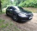 Черный Мазда 6, объемом двигателя 2 л и пробегом 300 тыс. км за 3021 $, фото 5 на Automoto.ua
