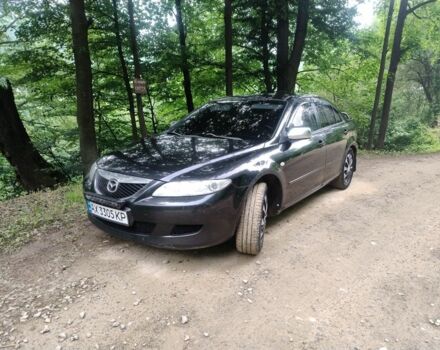 Черный Мазда 6, объемом двигателя 2 л и пробегом 300 тыс. км за 3021 $, фото 7 на Automoto.ua