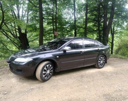 Черный Мазда 6, объемом двигателя 2 л и пробегом 300 тыс. км за 3021 $, фото 6 на Automoto.ua