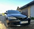 Черный Мазда 6, объемом двигателя 2 л и пробегом 200 тыс. км за 3800 $, фото 1 на Automoto.ua