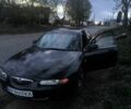 Черный Мазда 6, объемом двигателя 2 л и пробегом 450 тыс. км за 1009 $, фото 1 на Automoto.ua