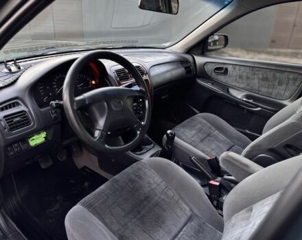 Черный Мазда 6, объемом двигателя 2 л и пробегом 300 тыс. км за 1800 $, фото 8 на Automoto.ua