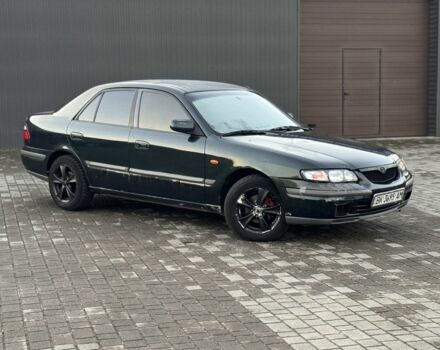 Черный Мазда 6, объемом двигателя 2 л и пробегом 300 тыс. км за 1800 $, фото 3 на Automoto.ua