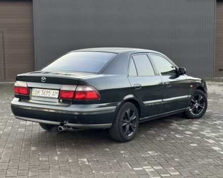 Черный Мазда 6, объемом двигателя 2 л и пробегом 300 тыс. км за 1800 $, фото 4 на Automoto.ua