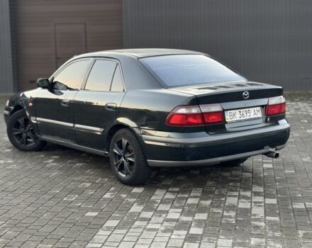 Черный Мазда 6, объемом двигателя 2 л и пробегом 300 тыс. км за 1800 $, фото 6 на Automoto.ua