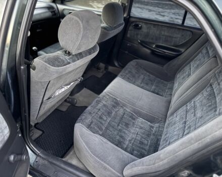 Черный Мазда 6, объемом двигателя 2 л и пробегом 300 тыс. км за 1800 $, фото 10 на Automoto.ua