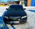 Черный Мазда 6, объемом двигателя 1.8 л и пробегом 210 тыс. км за 4600 $, фото 1 на Automoto.ua