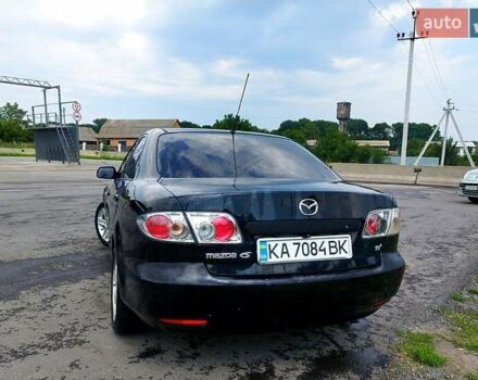 Черный Мазда 6, объемом двигателя 1.8 л и пробегом 346 тыс. км за 3500 $, фото 1 на Automoto.ua