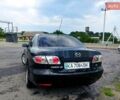 Черный Мазда 6, объемом двигателя 1.8 л и пробегом 346 тыс. км за 3500 $, фото 1 на Automoto.ua