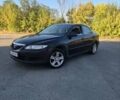 Черный Мазда 6, объемом двигателя 2 л и пробегом 10 тыс. км за 3300 $, фото 1 на Automoto.ua