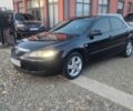 Черный Мазда 6, объемом двигателя 2 л и пробегом 304 тыс. км за 2600 $, фото 1 на Automoto.ua