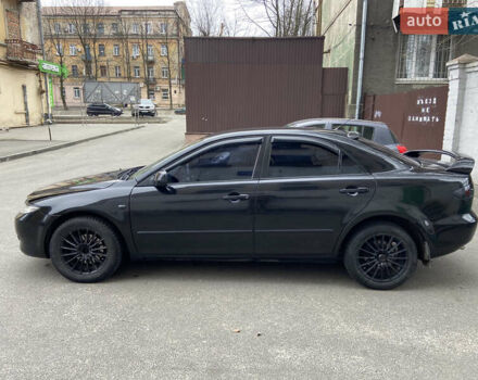 Черный Мазда 6, объемом двигателя 2.3 л и пробегом 173 тыс. км за 4600 $, фото 4 на Automoto.ua
