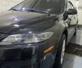 Черный Мазда 6, объемом двигателя 2.3 л и пробегом 355 тыс. км за 5200 $, фото 1 на Automoto.ua