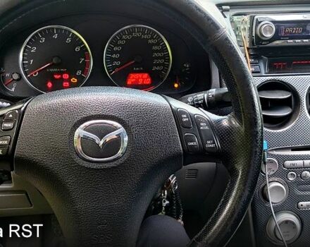 Черный Мазда 6, объемом двигателя 1.8 л и пробегом 346 тыс. км за 3500 $, фото 5 на Automoto.ua