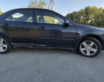 Черный Мазда 6, объемом двигателя 2 л и пробегом 10 тыс. км за 3300 $, фото 1 на Automoto.ua
