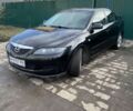 Черный Мазда 6, объемом двигателя 2 л и пробегом 326 тыс. км за 4500 $, фото 1 на Automoto.ua