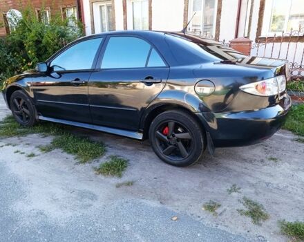 Черный Мазда 6, объемом двигателя 2 л и пробегом 350 тыс. км за 2999 $, фото 4 на Automoto.ua