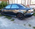 Черный Мазда 6, объемом двигателя 2 л и пробегом 350 тыс. км за 2999 $, фото 4 на Automoto.ua