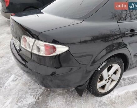 Черный Мазда 6, объемом двигателя 2 л и пробегом 350 тыс. км за 2400 $, фото 8 на Automoto.ua