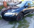 Черный Мазда 6, объемом двигателя 2 л и пробегом 350 тыс. км за 2999 $, фото 3 на Automoto.ua