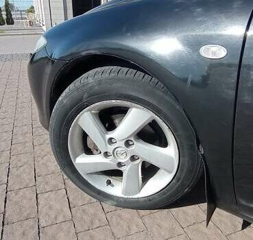 Черный Мазда 6, объемом двигателя 2 л и пробегом 374 тыс. км за 4199 $, фото 11 на Automoto.ua