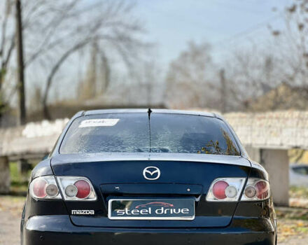 Чорний Мазда 6, об'ємом двигуна 2 л та пробігом 242 тис. км за 3499 $, фото 4 на Automoto.ua