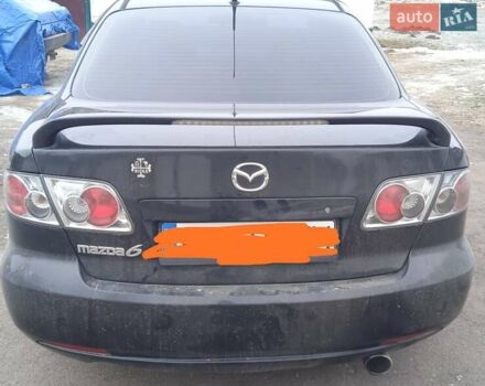Черный Мазда 6, объемом двигателя 2 л и пробегом 249 тыс. км за 4555 $, фото 1 на Automoto.ua