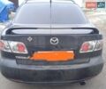 Черный Мазда 6, объемом двигателя 2 л и пробегом 249 тыс. км за 4555 $, фото 1 на Automoto.ua