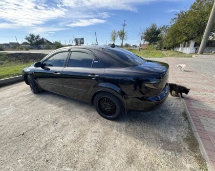 Чорний Мазда 6, об'ємом двигуна 2 л та пробігом 313 тис. км за 3800 $, фото 3 на Automoto.ua