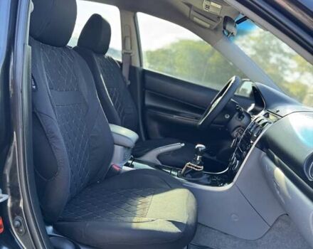 Чорний Мазда 6, об'ємом двигуна 2 л та пробігом 330 тис. км за 3400 $, фото 20 на Automoto.ua