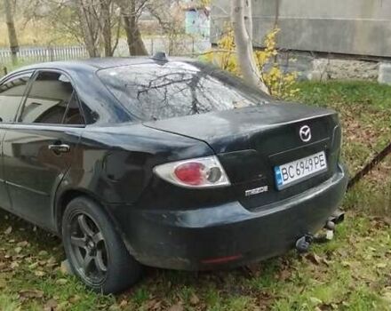 Черный Мазда 6, объемом двигателя 1.8 л и пробегом 350 тыс. км за 2500 $, фото 2 на Automoto.ua
