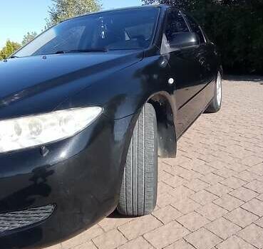 Черный Мазда 6, объемом двигателя 2 л и пробегом 374 тыс. км за 4199 $, фото 3 на Automoto.ua