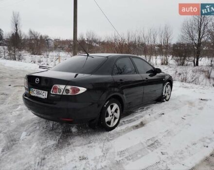 Черный Мазда 6, объемом двигателя 2 л и пробегом 350 тыс. км за 2400 $, фото 12 на Automoto.ua