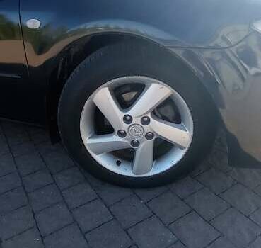 Черный Мазда 6, объемом двигателя 2 л и пробегом 374 тыс. км за 4199 $, фото 14 на Automoto.ua