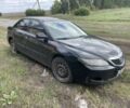 Черный Мазда 6, объемом двигателя 2 л и пробегом 330 тыс. км за 2859 $, фото 4 на Automoto.ua