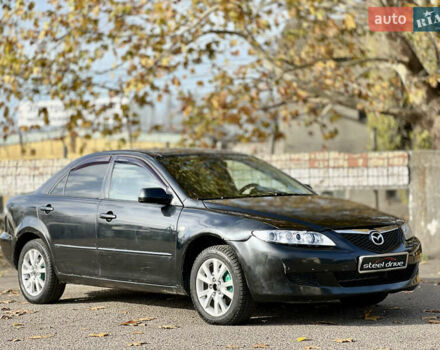 Чорний Мазда 6, об'ємом двигуна 2 л та пробігом 242 тис. км за 3499 $, фото 2 на Automoto.ua