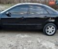 Черный Мазда 6, объемом двигателя 1.8 л и пробегом 345 тыс. км за 3200 $, фото 2 на Automoto.ua