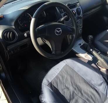 Черный Мазда 6, объемом двигателя 2 л и пробегом 374 тыс. км за 4199 $, фото 19 на Automoto.ua
