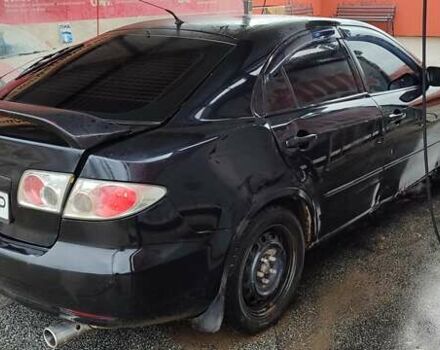 Черный Мазда 6, объемом двигателя 2 л и пробегом 317 тыс. км за 3000 $, фото 1 на Automoto.ua